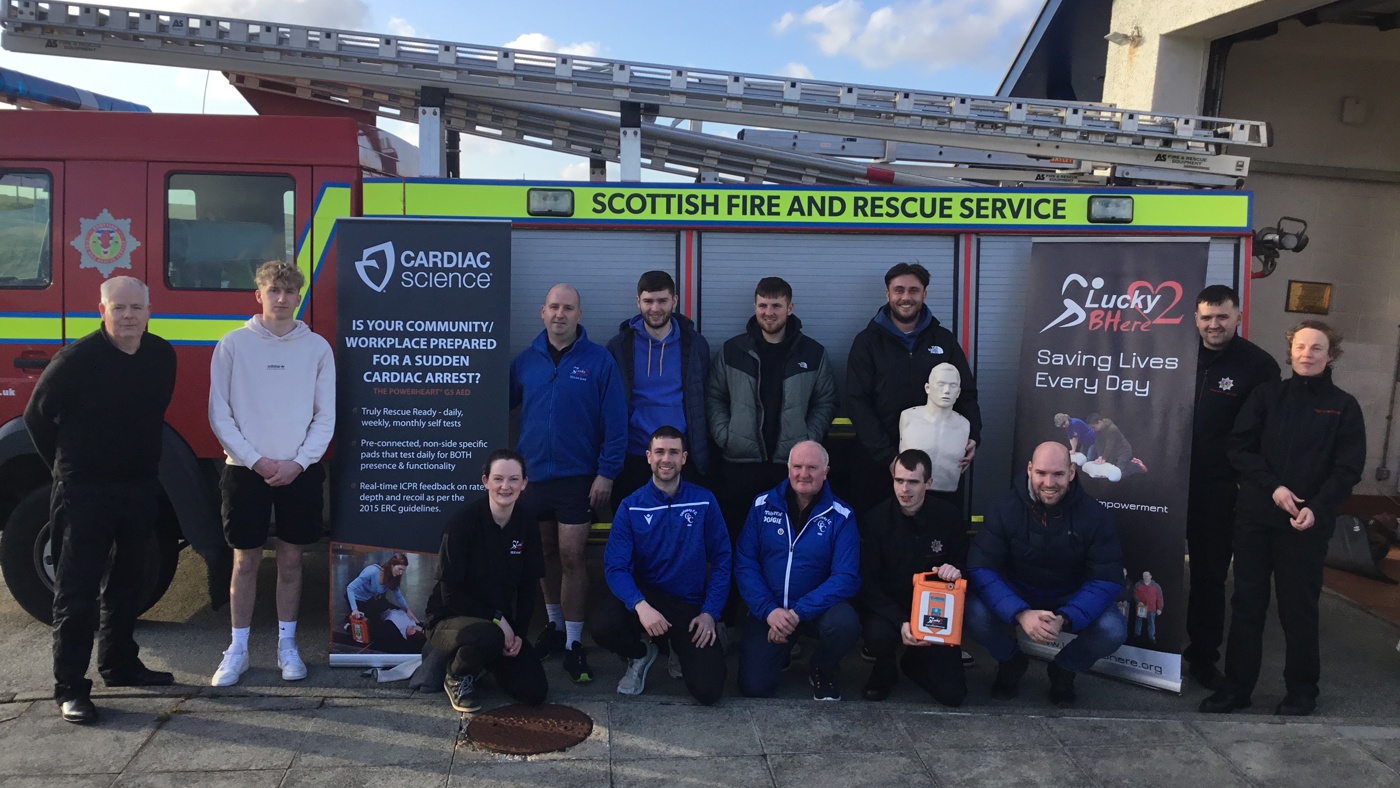 Men attending CPR awareness session in Western Isles