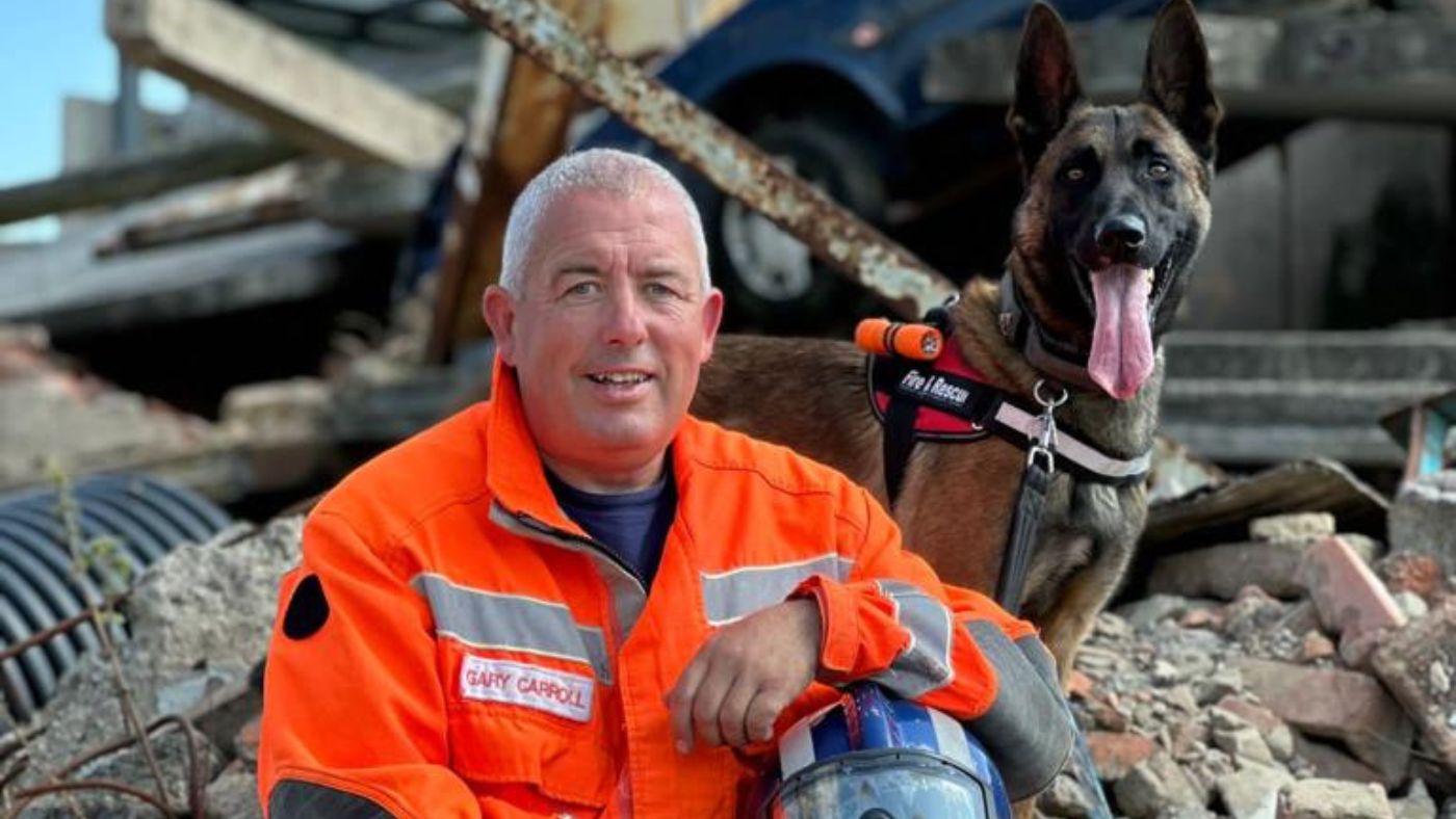 Crew Commander Gary Carroll with USAR dog Coorie